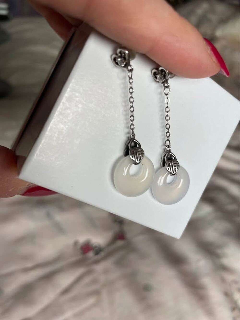 White jade donut dangly earrings